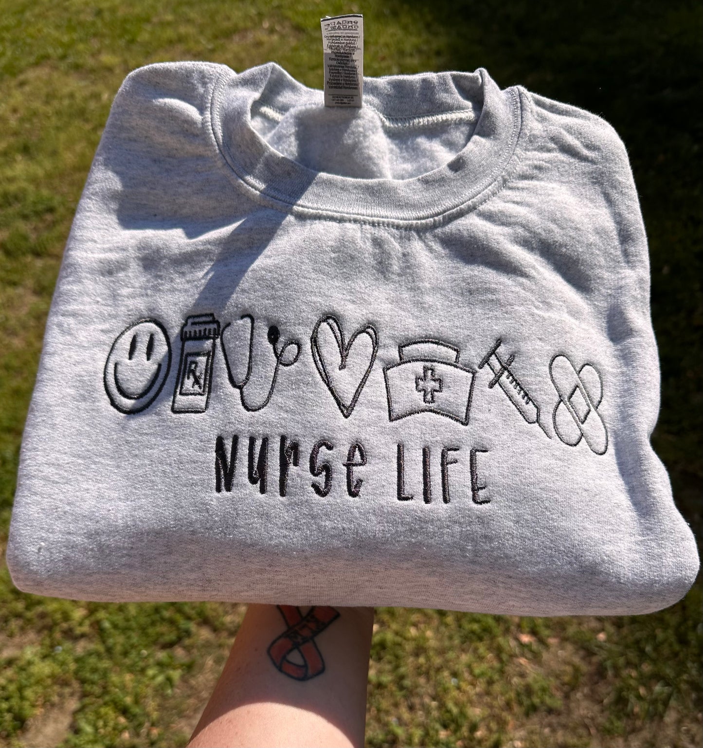 Embroidered nurse icons crewneck