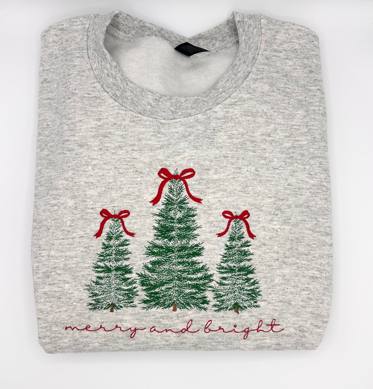 Embroidered Christmas tree with bow crewneck.