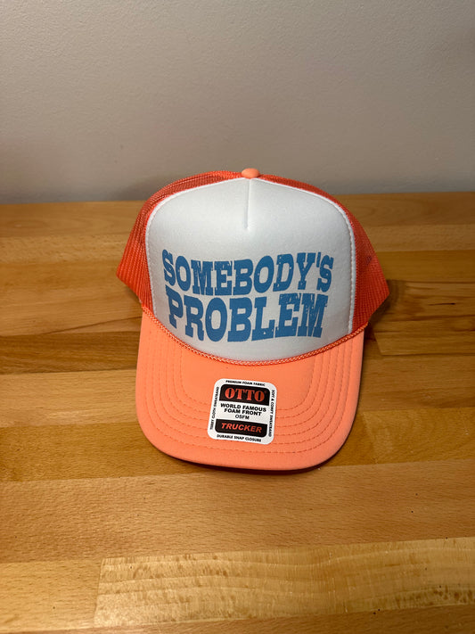 Somebody’s problem Coral foam trucker hat