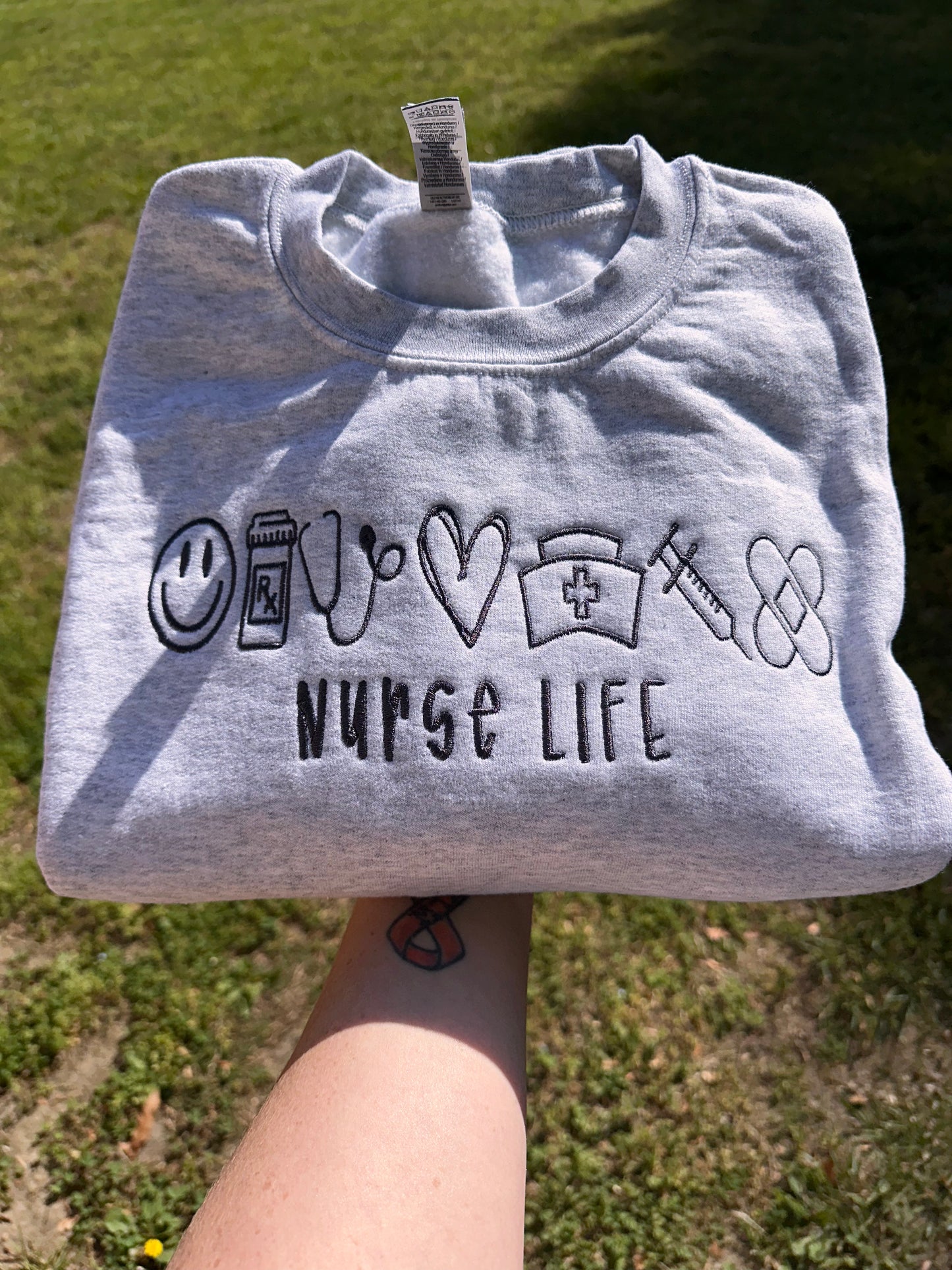 Embroidered nurse icons crewneck