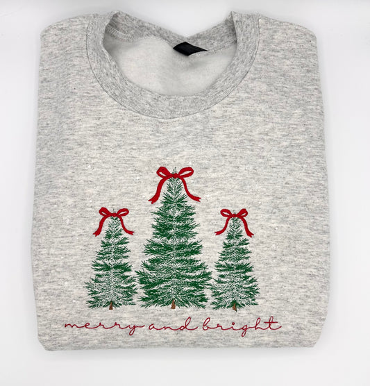 Embroidered Christmas tree with bow crewneck.